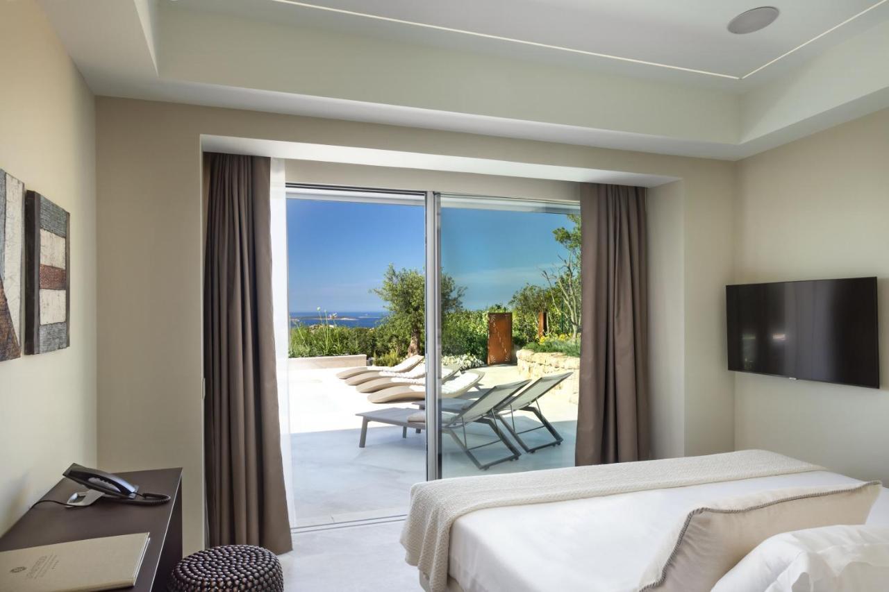 Hotel Li Finistreddi Канниджионе Экстерьер фото